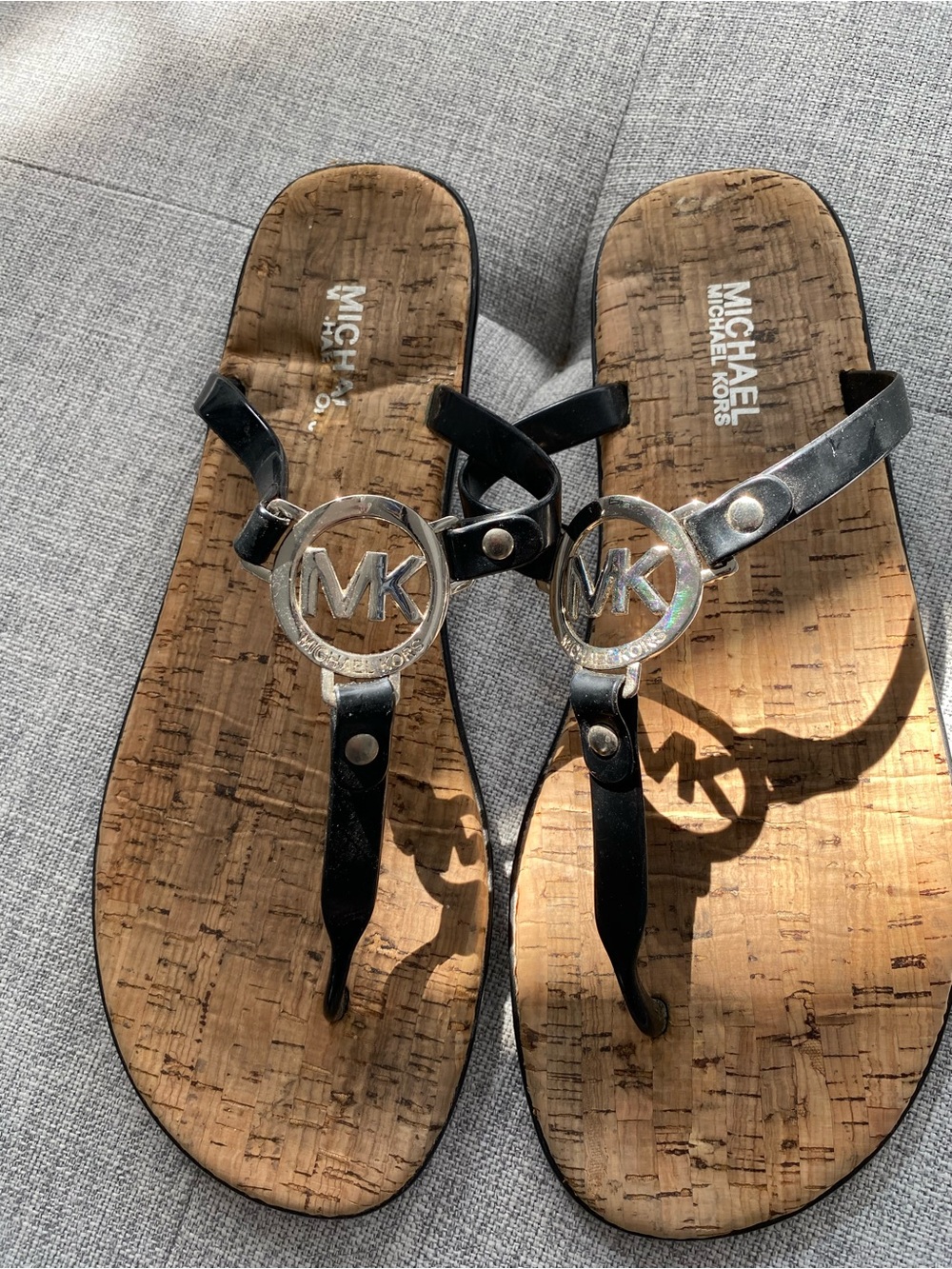 Michael Kors Black Cork Logo Thong Sandals with Silver MK Emblems